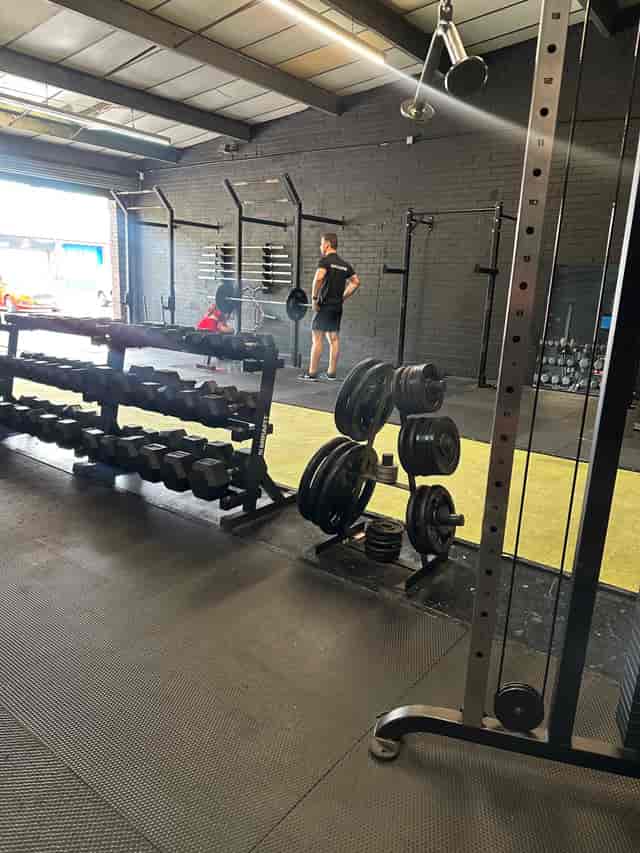 CrossFit Ancoats industrial training floor for team-building workshops and wellness retreats.