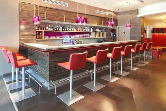 Tipsy Bar at Holiday Inn Almaty: sleek hotel bar setting for corporate events and networking.