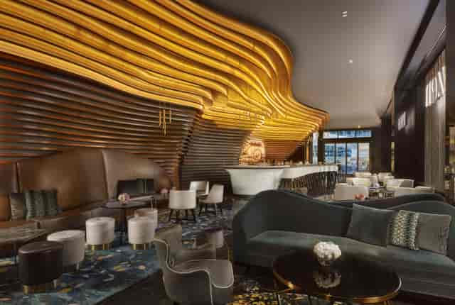 VIP room at The Ritz-Carlton Astana with illuminated ceiling for luxury corporate networking events.