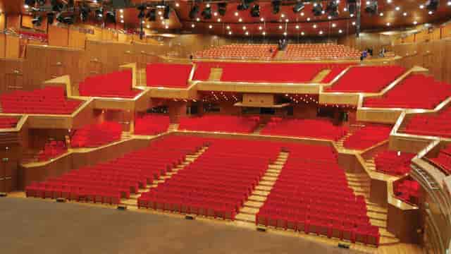 Main Hall Astana auditorium with tiered seating for corporate awards and plenary sessions.