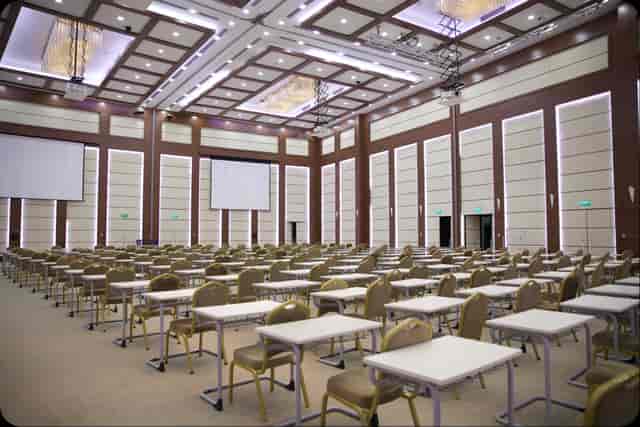 Blue Hall classroom setup at Nazarbayev University Convention Center for corporate training seminar.