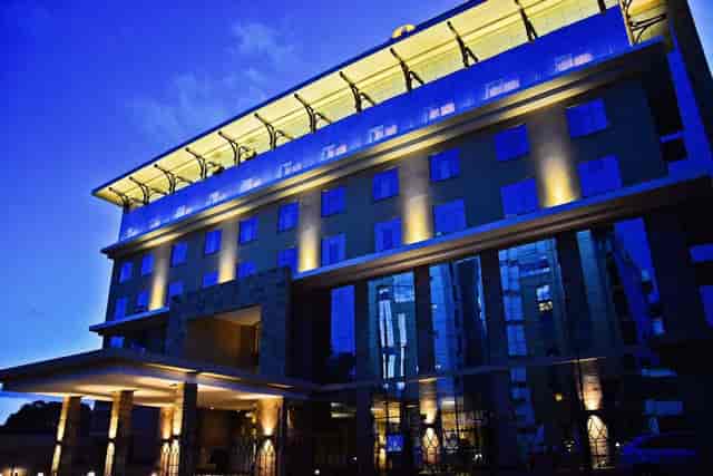 Modern DoubleTree by Hilton Nairobi hotel exterior at twilight for corporate and evening events.