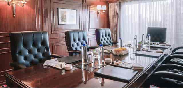 Churchill Ballroom boardroom setup with wood paneling for executive meetings and corporate events.