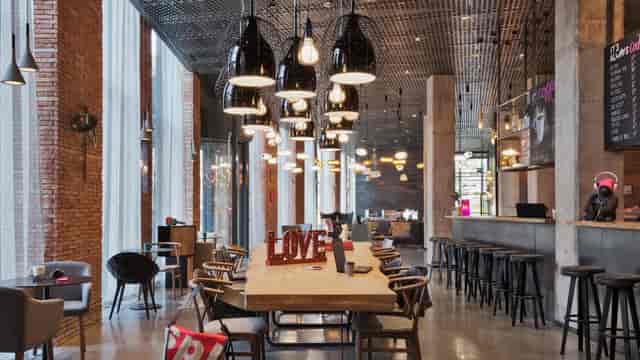 Industrial-chic Auditoria at Moxy Tbilisi for networking and creative team brainstorming sessions.