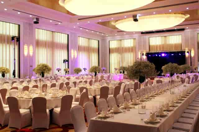 Hualing Ballroom with elegant banquet seating for corporate galas and wedding receptions.