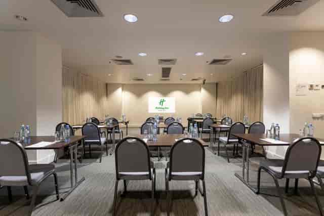 Classroom-style meeting room at Holiday Inn Tbilisi, ideal for corporate training and workshops.