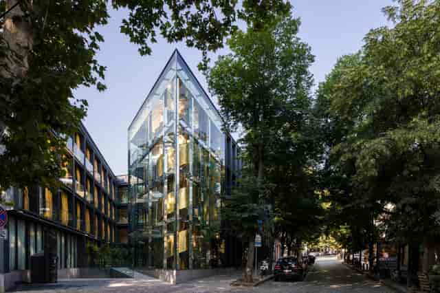 Gastromania Restaurant: Modern glass venue for corporate networking and brand events.
