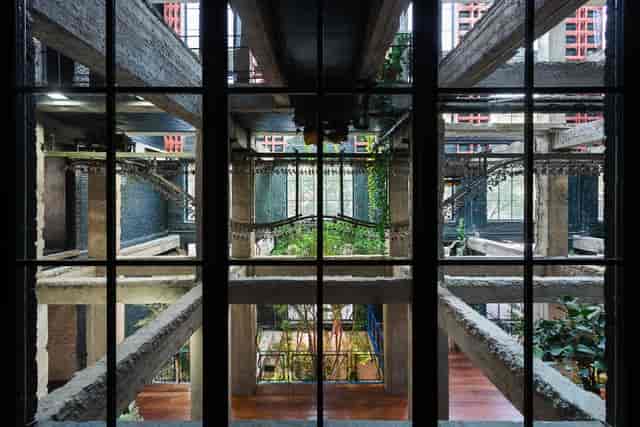 Stamba Hotel industrial amphitheater with concrete architecture for networking or product launch.