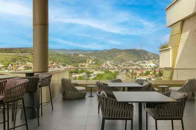 Stamba Hotel rooftop venue with city views for premium networking mixers and cocktail receptions.