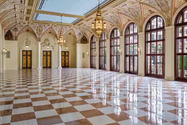 Luxury ballroom with marble floors for high-end galas and corporate ceremonies.