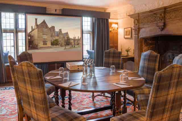 The Cromwell Room boardroom with tartan seating for executive retreats and corporate meetings.