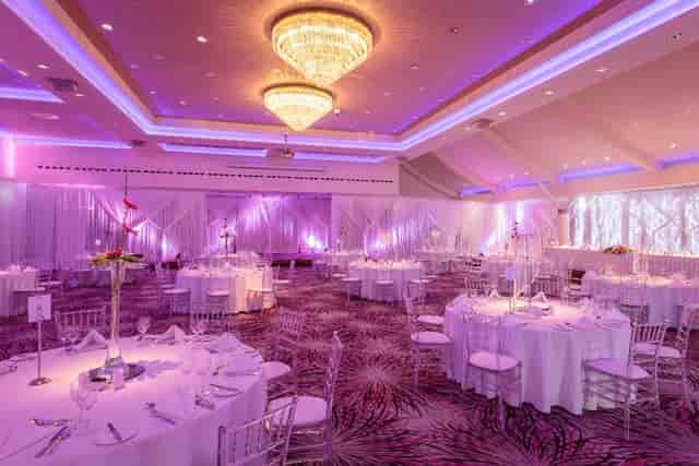 Grand Ballroom at Stormont Hotel with purple lighting for gala or wedding reception.