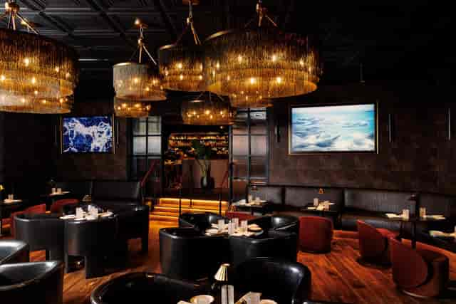 Main Indoor Lounge with pendant lighting for VIP receptions and corporate networking events.