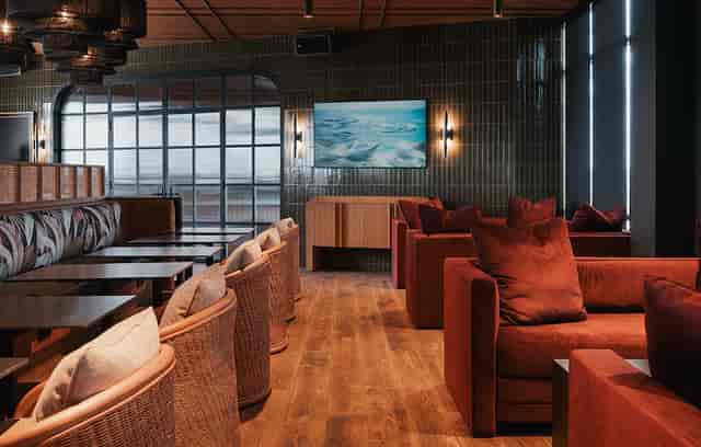 Private Dining Room at Realm Rooftop Bar: lounge seating for VIP networking and breakout sessions.