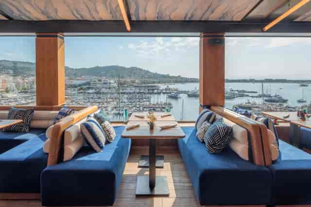 Retreat Room at Canopy Cannes: Waterfront venue with panoramic marina views for VIP events.