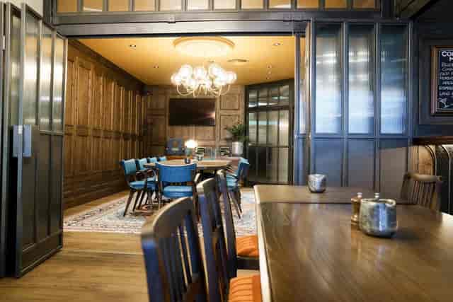Boardroom at The White Horse Wembley for private dining and corporate meetings.