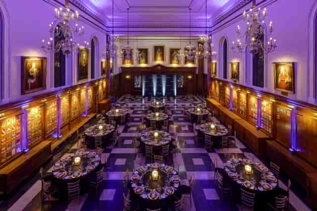 Inner Temple Hall gala venue with purple uplighting for corporate events and awards dinners.