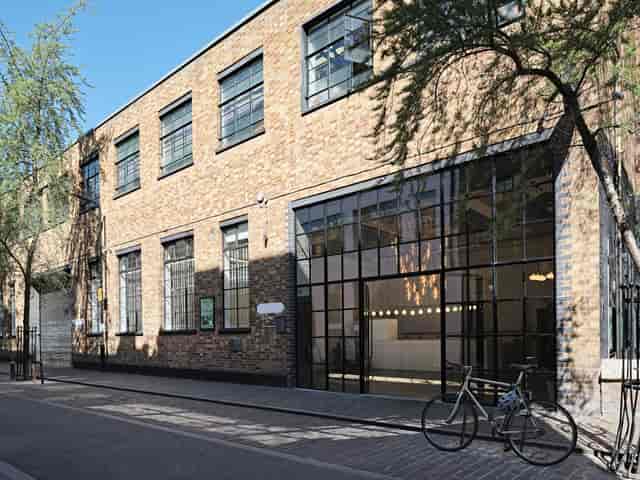 Studio 1+2 blank-canvas venue with industrial brick walls for pop-up exhibitions and workshops.