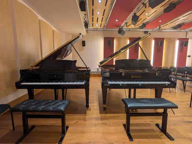 Royal Academy of Music Concert Room with dual grand pianos for musical recitals and performances.