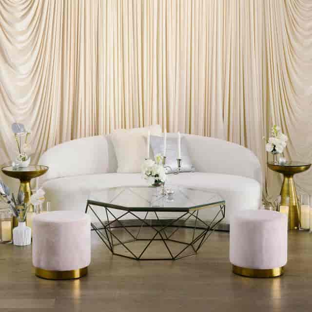 Curved sofa in The Mill lounge, ideal for high-end event decor and VIP hospitality suite setups.
