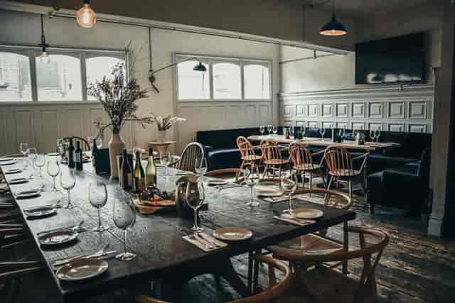 Rustic-chic private dining space at The London Sketch Club for corporate dinners and meetings.