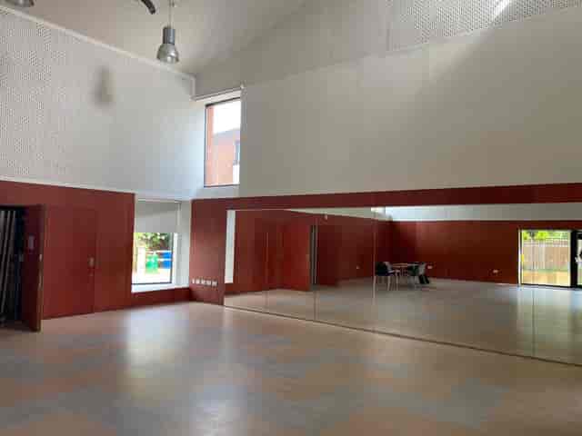 Holly, The Green Nunhead multi-purpose studio with mirrored walls for workshops and yoga events.