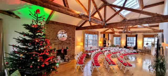 Rustic Shoreditch Loft venue with exposed timber trusses for Christmas event or holiday party.