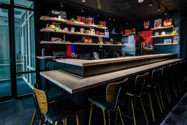 Basement Bar at The Golden Fleece featuring high-top seating for corporate networking events.