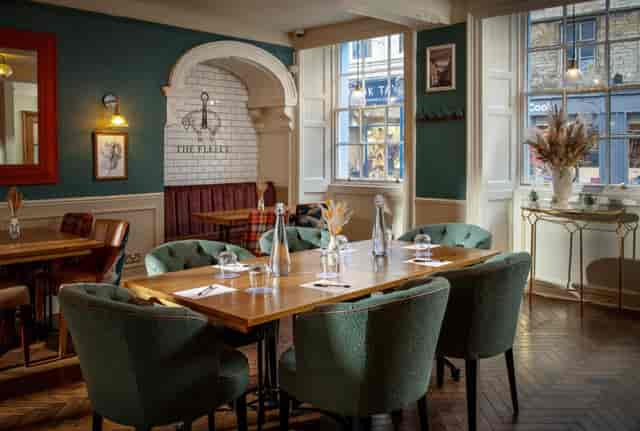 Main Restaurant at The Golden Fleece: Sophisticated boutique setting for professional board dinners.