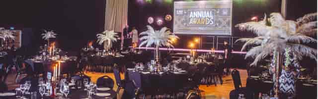 Art Deco gala stage at O2 Academy2 Islington for corporate awards ceremony with banquet seating.