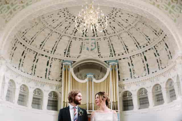 Ornate dome auditorium in Everyday Church, perfect for upscale wedding ceremonies and boutique galas.