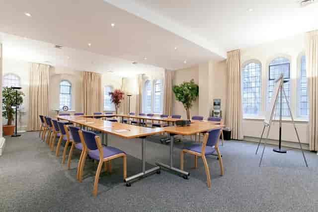 Trevelyan Hall meeting room with ergonomic chairs, ideal for conferences and presentations.