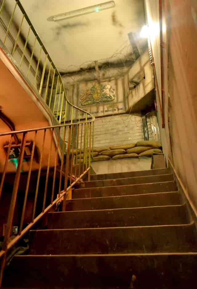 Industrial staircase in Bunker 51, ideal for unique events and immersive experiences.