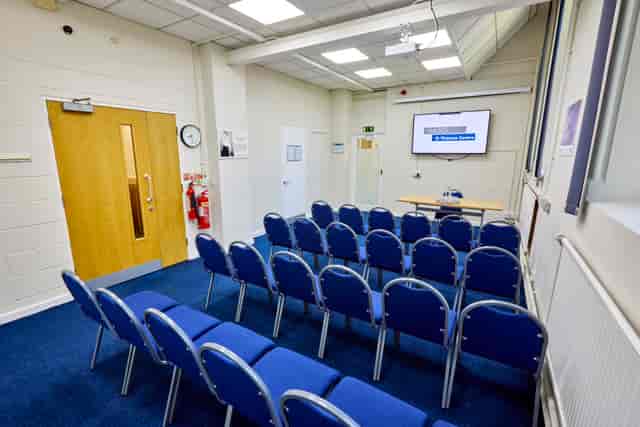 Wilkinson Room at St Thomas Centre: organized meeting space for workshops and conferences.