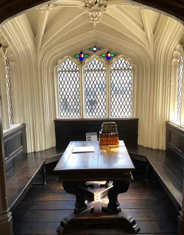 Chetham's Library Association Room with Gothic windows, perfect for meetings and workshops.