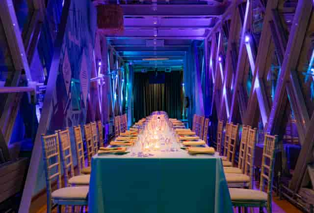 Elegant banquet table at Tower Bridge, illuminated for upscale events and corporate dinners.