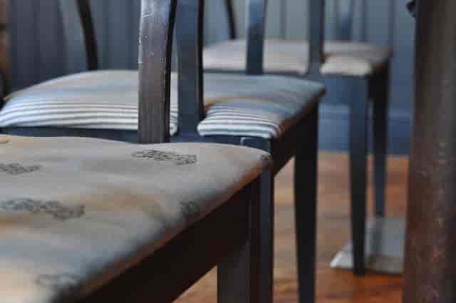 Elegant chairs at Magpie Bar, perfect for intimate meetings and events.