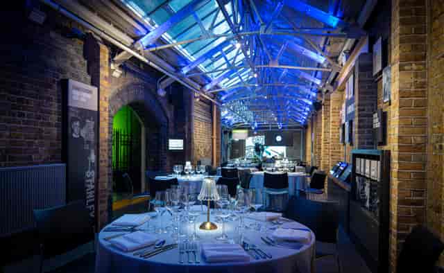 Industrial-chic Engine Rooms venue at Tower Bridge with vaulted ceiling for banquets and receptions.
