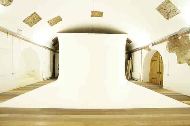 "Versatile event space in Canvas Works with seamless white backdrop and natural light."