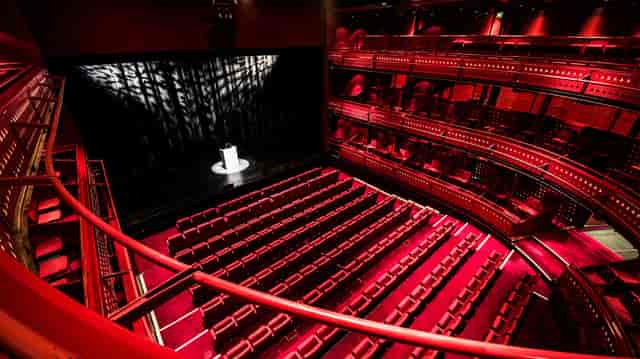 Quays Theatre at The Lowry with tiered seating, ideal for elegant presentations and performances.