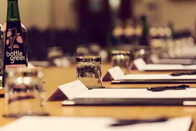 Clegg Suite meeting setup at Townhouse Hotel Manchester with elegant table settings.