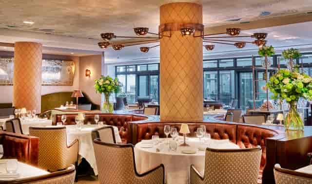 Private dining room in Sartoria with elegant decor for upscale events and meetings.