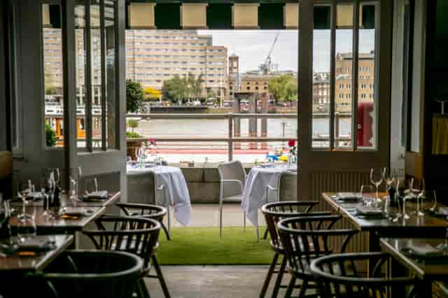 Elegant dining area at Butlers Wharf Chop House, ideal for waterfront events and celebrations.