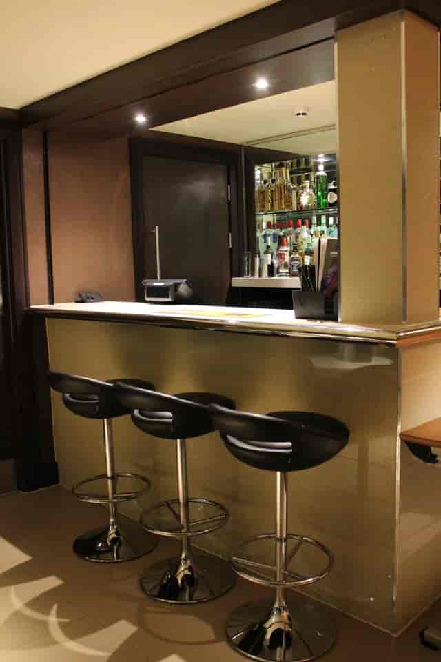 Sleek bar at Balcony Bar, Genting Club Manchester for networking events and cocktail receptions.