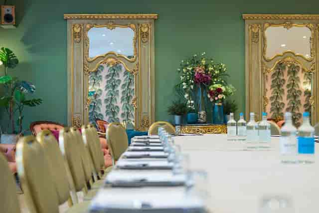 Luxury boardroom at The Rococo London with gold mirrors for corporate events and luxury meetings.