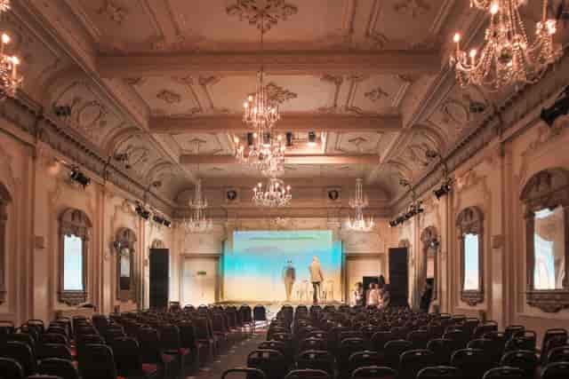 Elegant event space in Bush Hall with chandeliers, perfect for corporate meetings and performances.