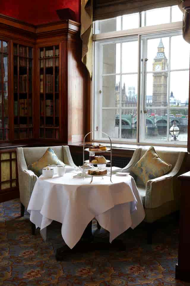 Elegant meeting space at London Marriott with pastries, ideal for high-end events.