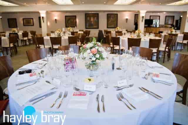 Elegant dining room at Hampton Court Palace, set for corporate events and celebrations.