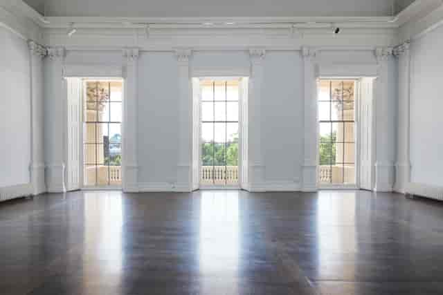 Spacious ICA event space with large windows, ideal for meetings and workshops.
