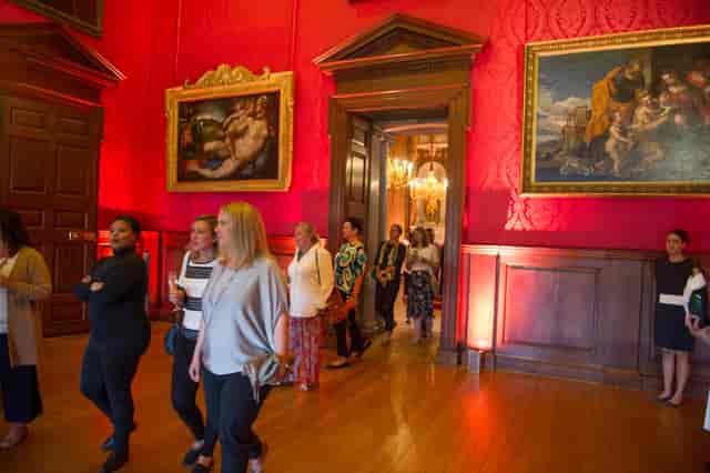 King's Drawing Room at Kensington Palace, elegant red walls, perfect for networking events.